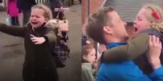 Cô bé vừa khóc, vừa ôm chầm lấy cha sau nhiều tháng xa cách gây xúc động