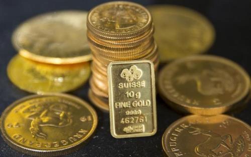 Giá vàng hạ do kỳ vọng Fed không giảm mạnh lãi suất