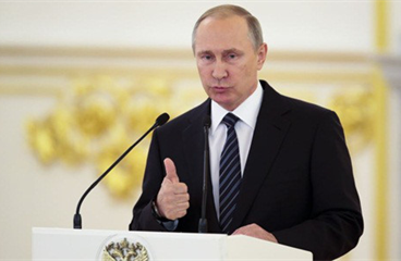 Nụ cười ông Putin và sự trở lại