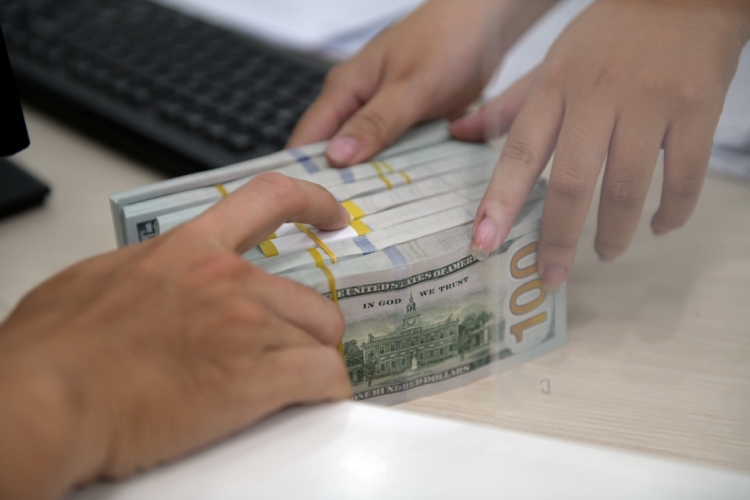 Đường đi của tỷ giá dưới sức ép thuế quan