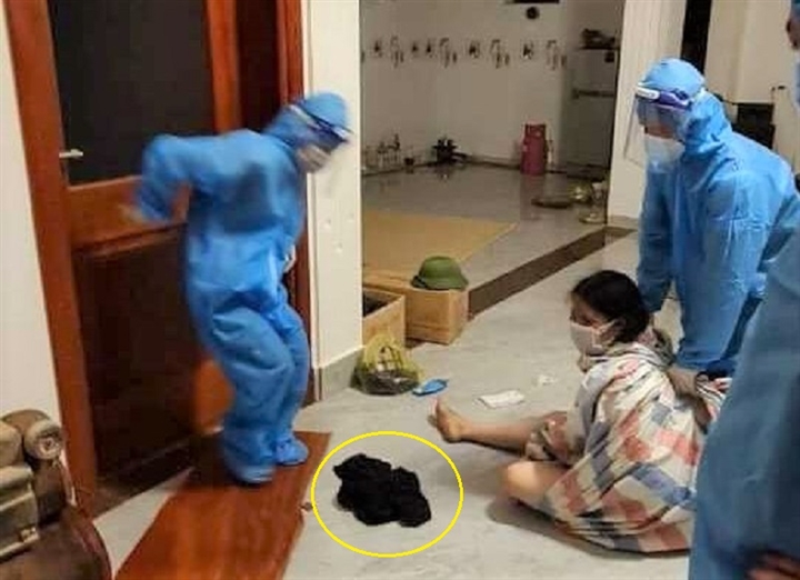 1 phụ nữ F1 cởi quần áo để chống đối việc đưa đi cách ly