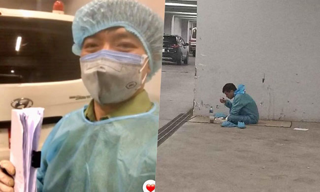 Người điều xe cách ly ăn vội cơm hộp ở hầm sân bay