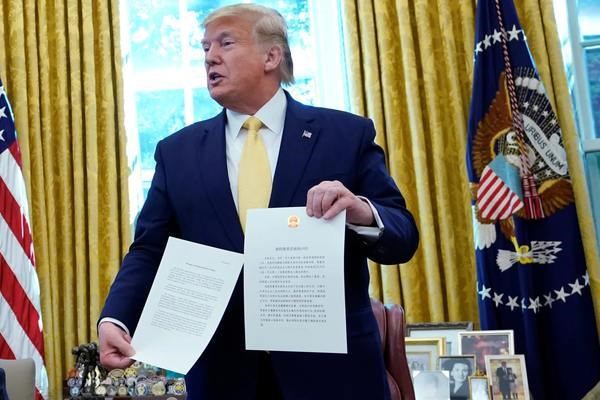 Ông Trump ký thoả thuận giai đoạn một với Trung Quốc