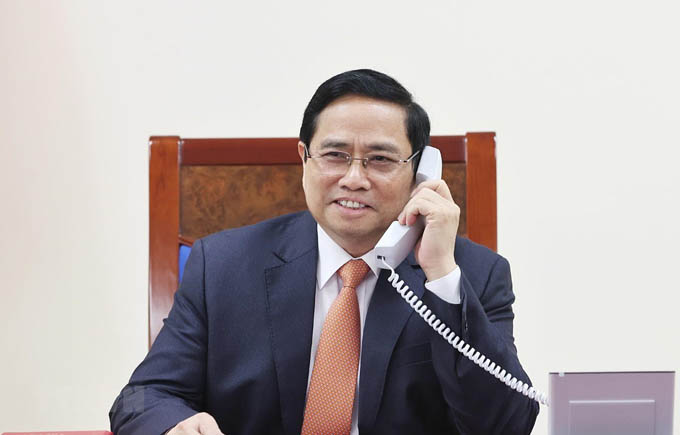 Thủ tướng Phạm Minh Chính điện đàm với Thủ tướng Singapore